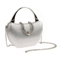 Bolso de mano Maritza Vintage – tejido metalizado plisado con pedrería