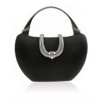 Bolso de mano Maritza Vintage – tejido metalizado plisado con pedrería